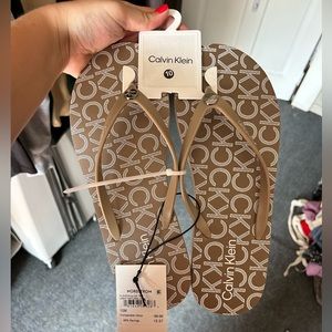 Size 10 Calvin Klein flip flops. NWT, never worn